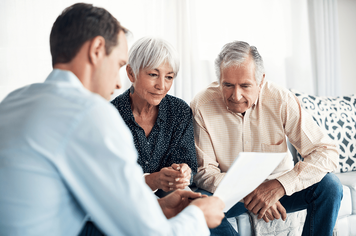 Senior couple consulting with professional