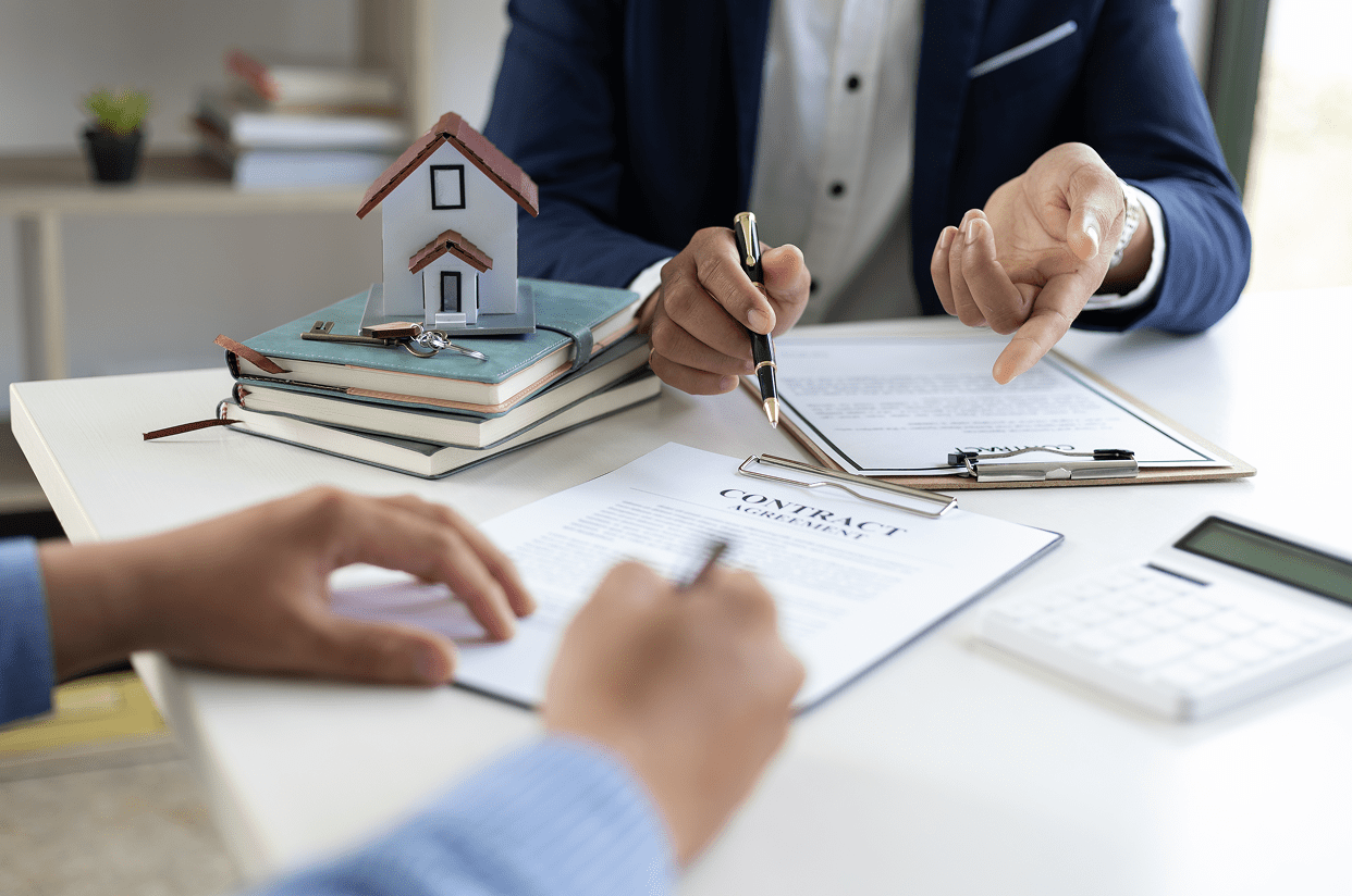 Business discussion with documents and calculator